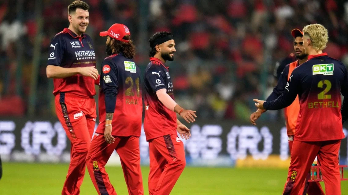 Suyash Sharma celebrating a wicket with RCB teammates [Source: AP]