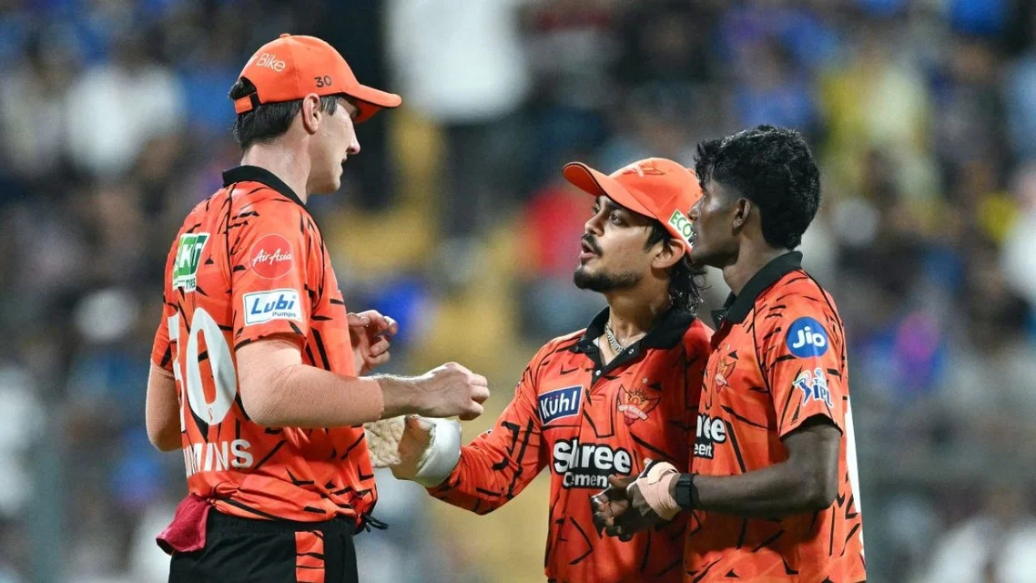 Pat Cummins and Ishan Kishan - (Source: AFP)