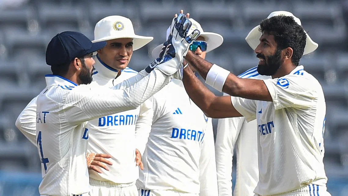 Jasprit Bumrah celebrating a wicket with KS Bharat (Source: AFP Photos)