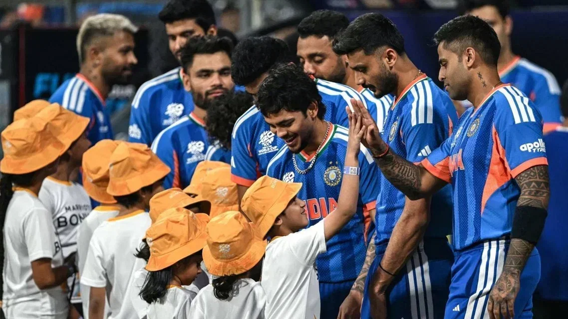 India cricketers having a light chat with kids (Source: AFP Photos)