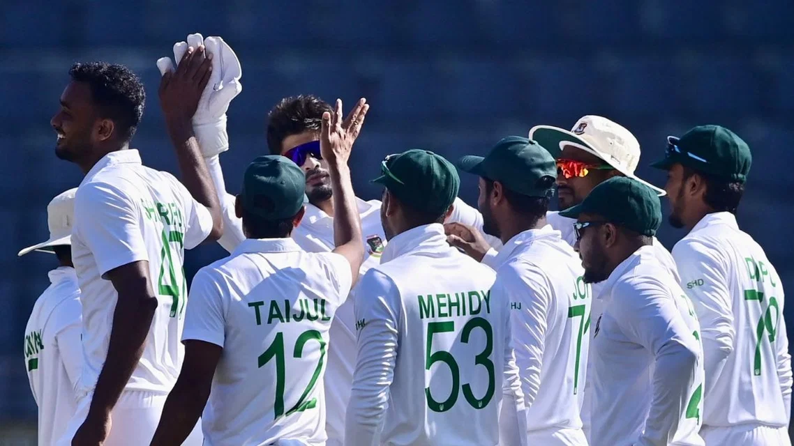 Shoriful Islam with Bangladesh team [Source: AFP]