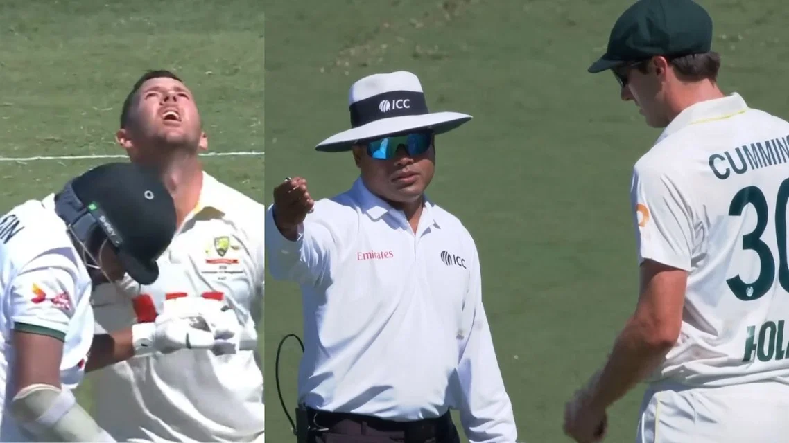 Pat Cummins argues with the umpire after collision [Source: Cricket Australia]