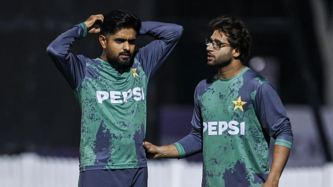 Imam-ul-Haq having a chat with Babar Azam (Source: AFP Photos)