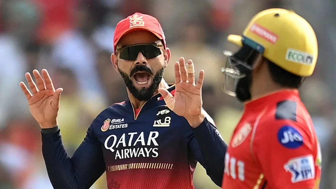 Virat Kohli having fun with Prabhsimran Singh. Image Credits: AFP