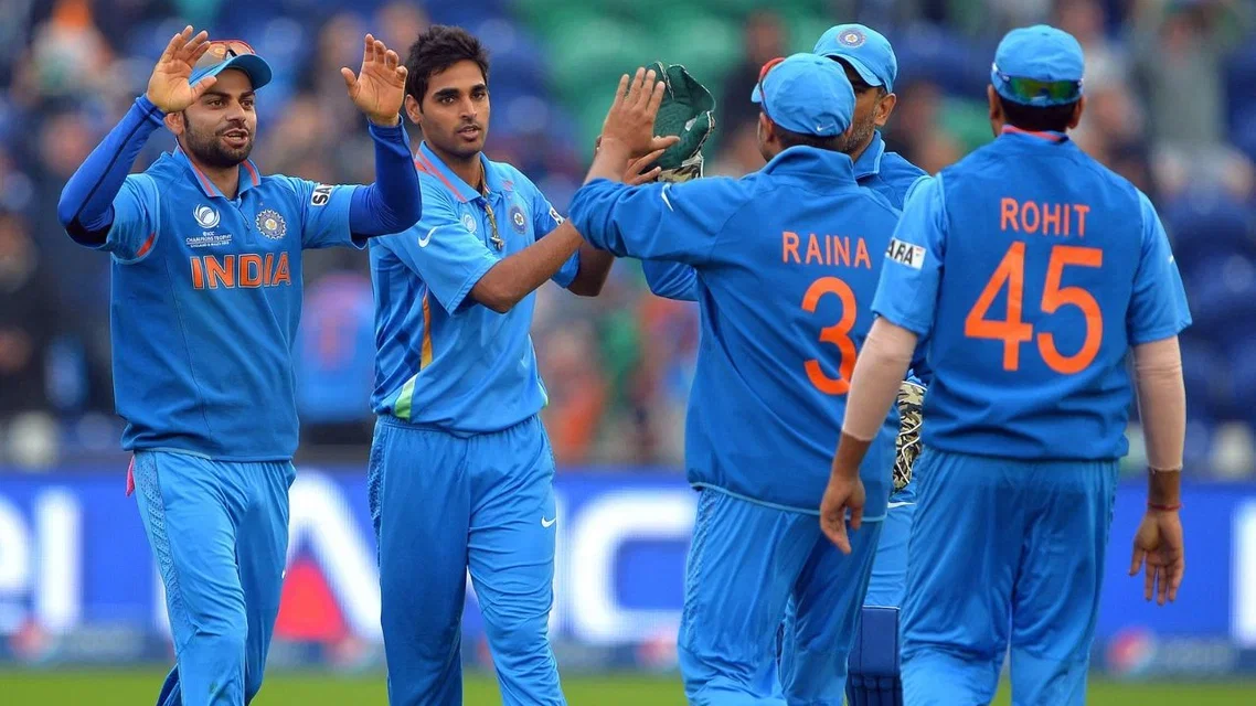Bhuvneshwar Kumar celebrating a wicket with old teammates (Source: AFP)