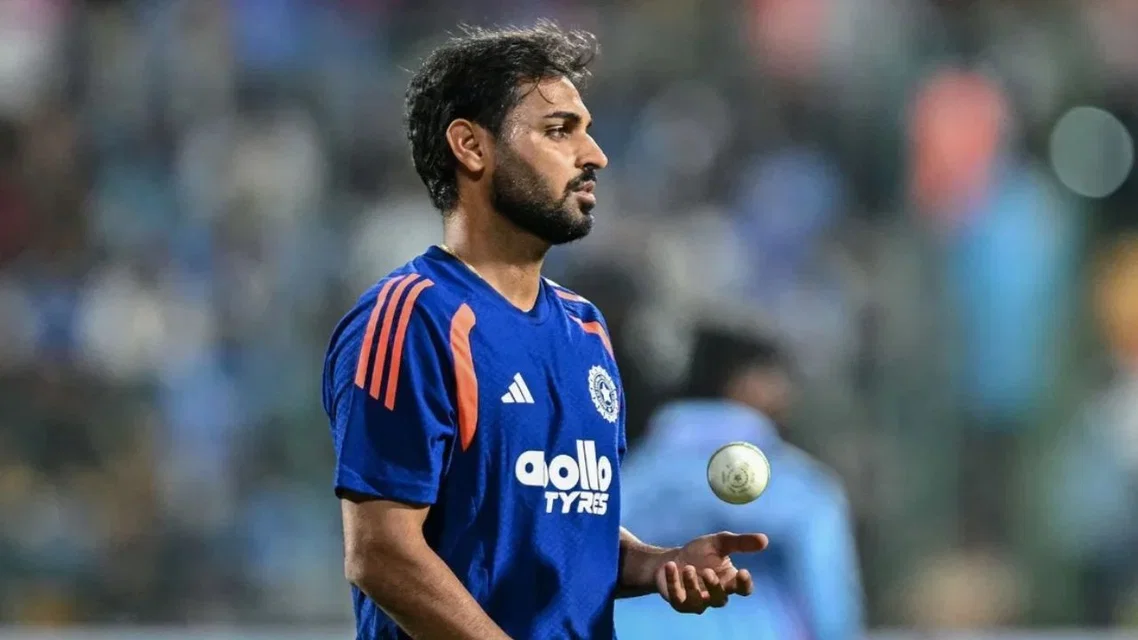 Bhuvneshar Kumar in Indian colours - (Source: AFP)
