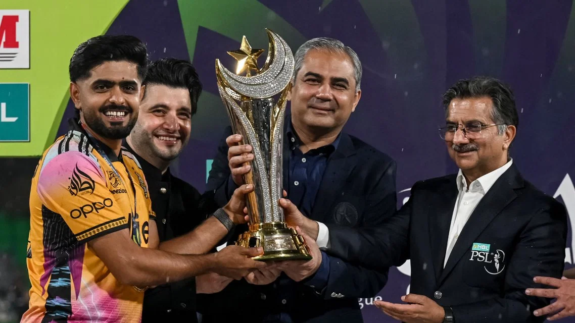 PCB, PSL dignitaries with Babar Azam after PSL 2026 victory | PC- AFP